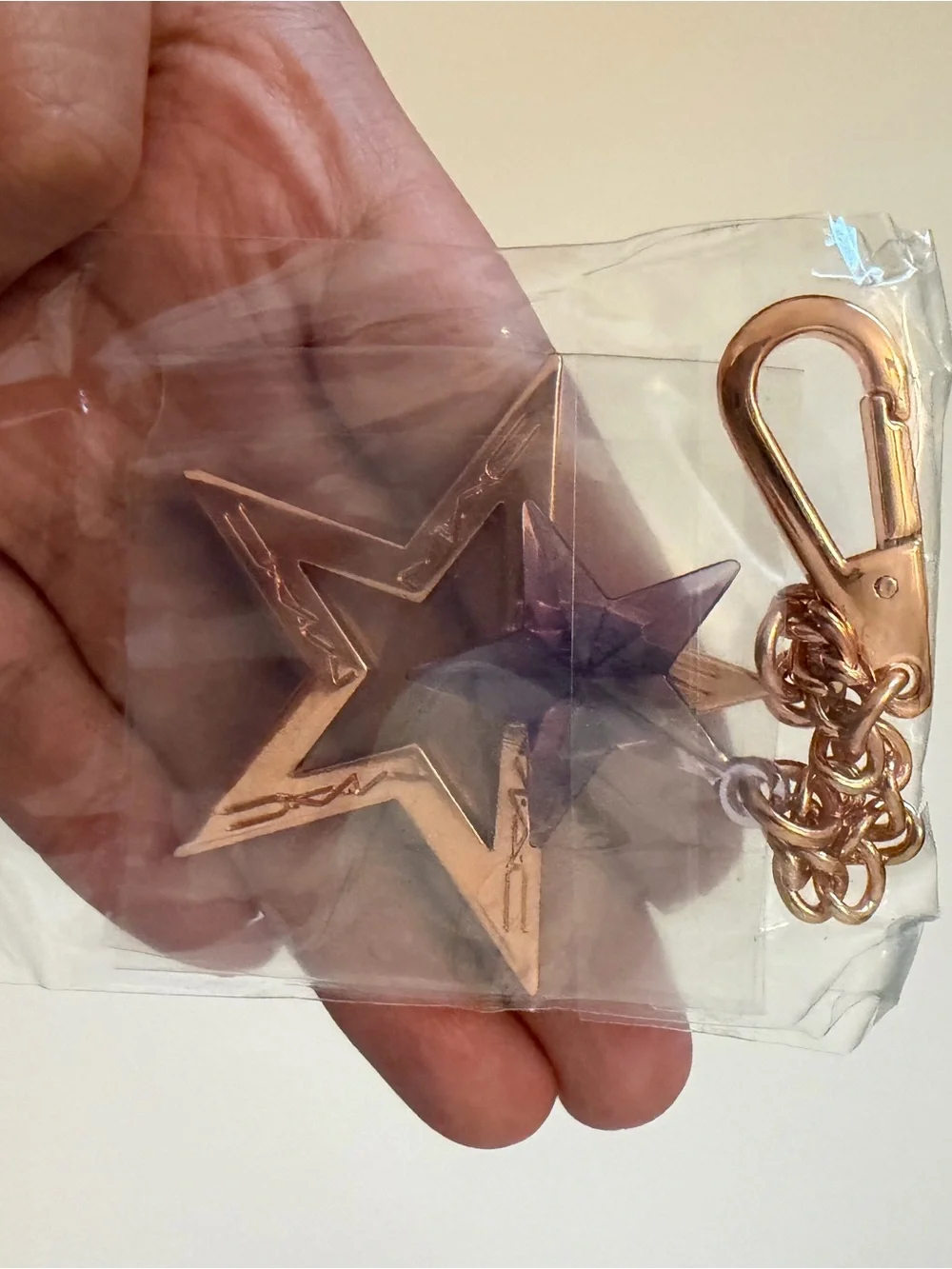 NWOT MAC keychain with Purple Star Accent